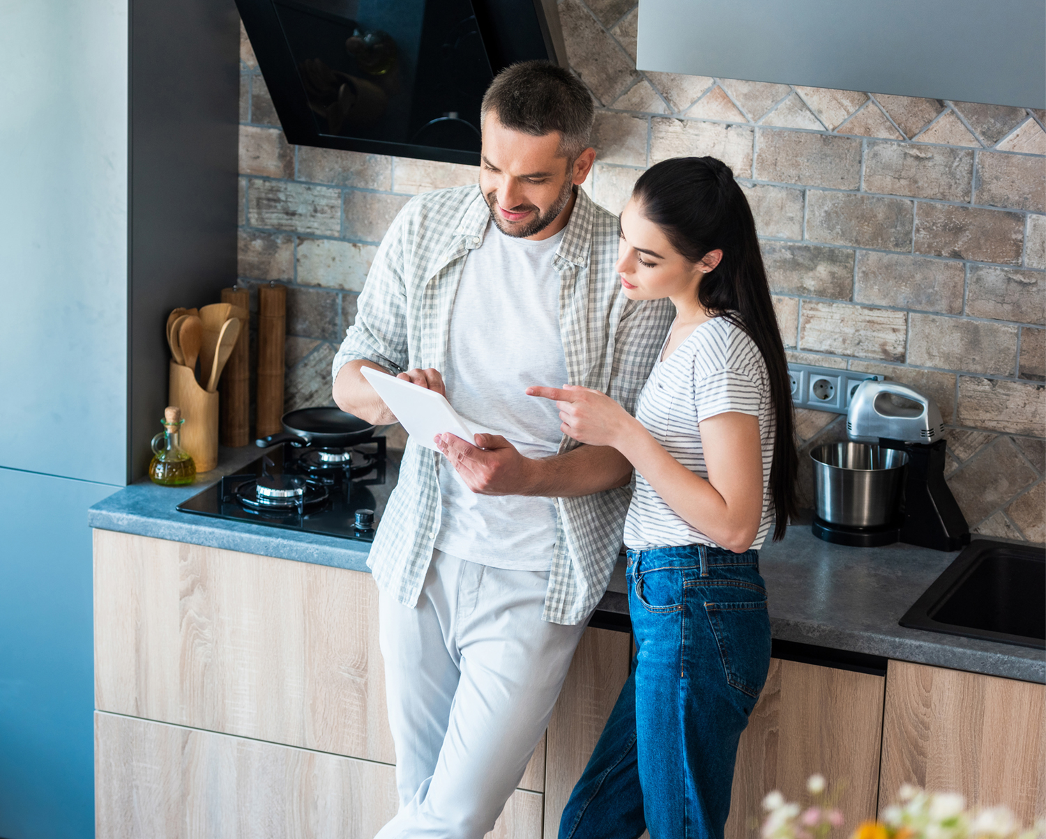 Homeowners looking at tablet